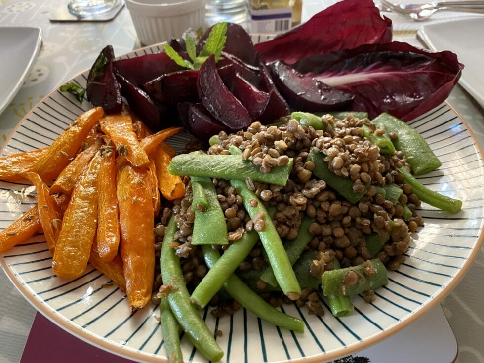 a white plate topped with lots of different types of food.
