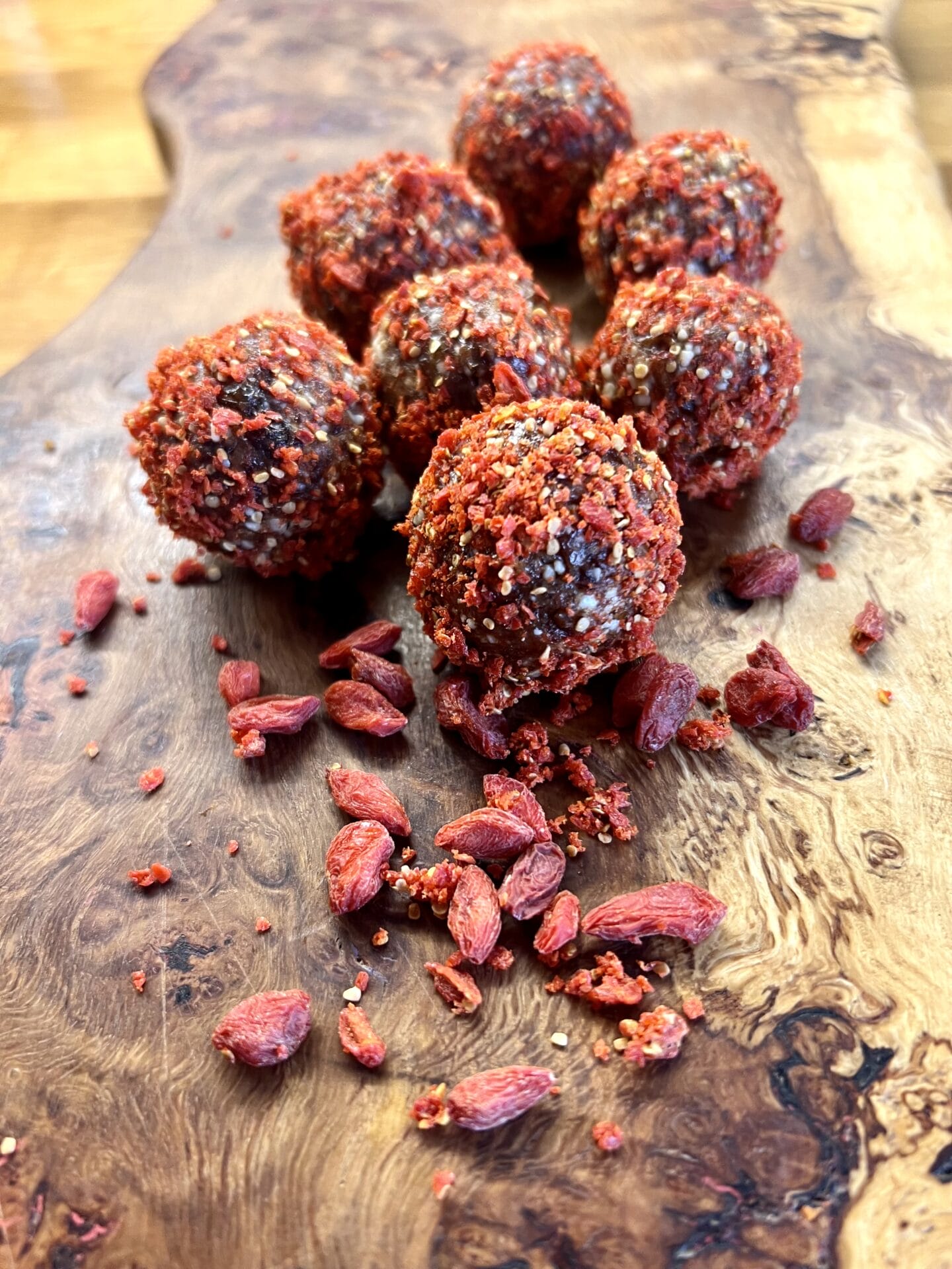 a wooden cutting board topped with lots of food.
