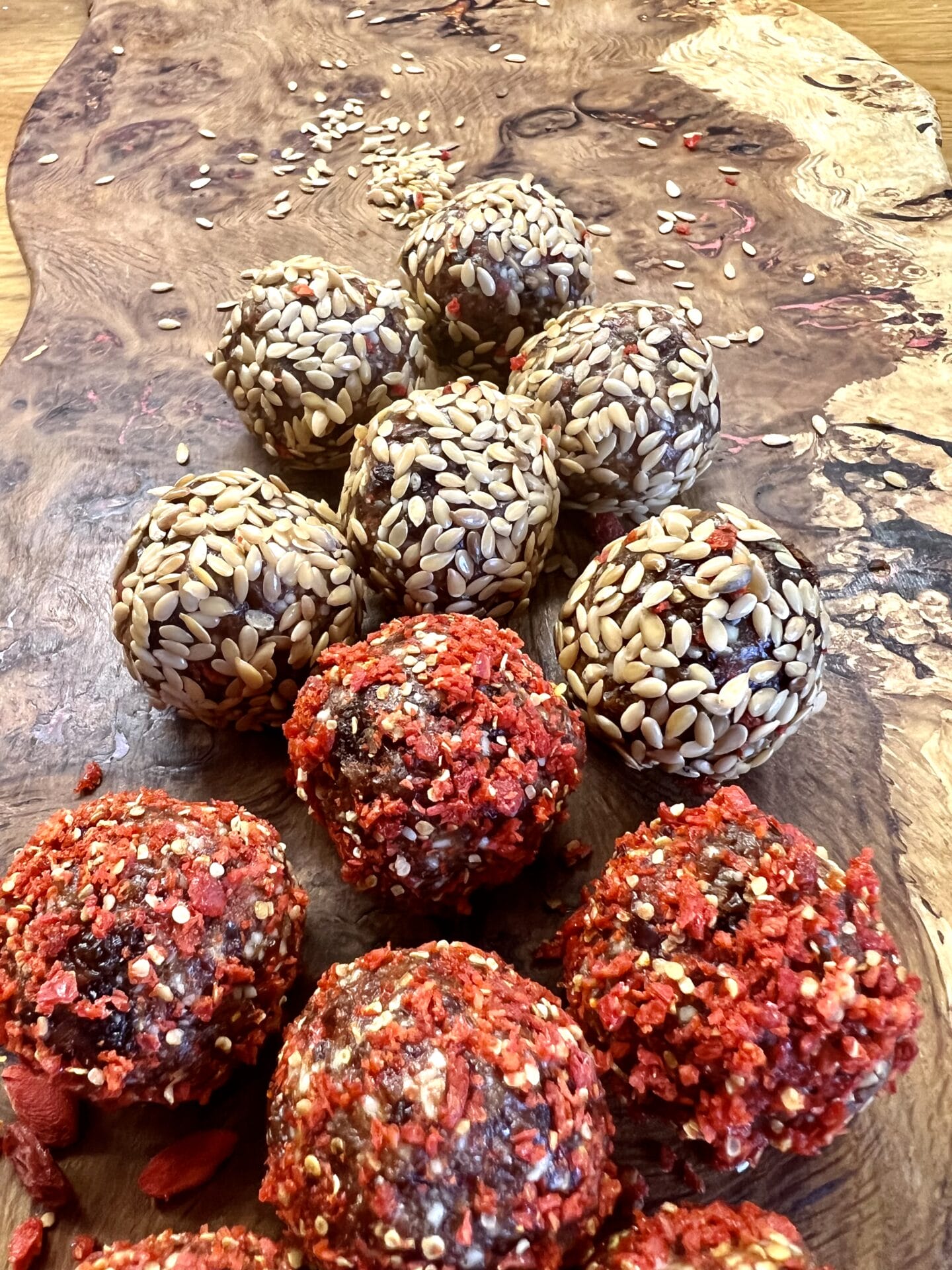 a wooden cutting board topped with lots of food.