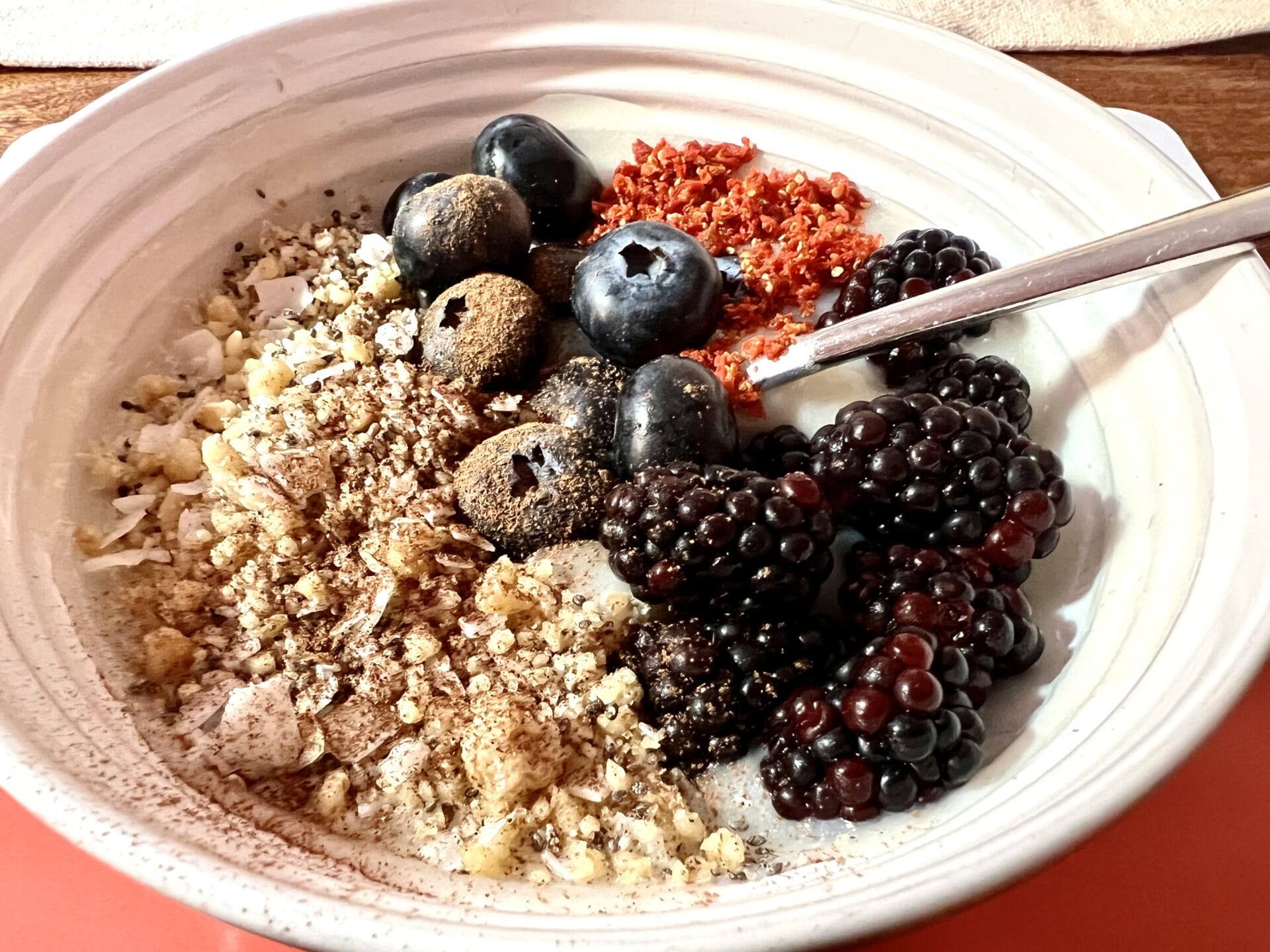 A go-to breakfast bowl with oatmeal, berries, and granola. A go-to breakfast bowl with oatmeal, berries, and granola.