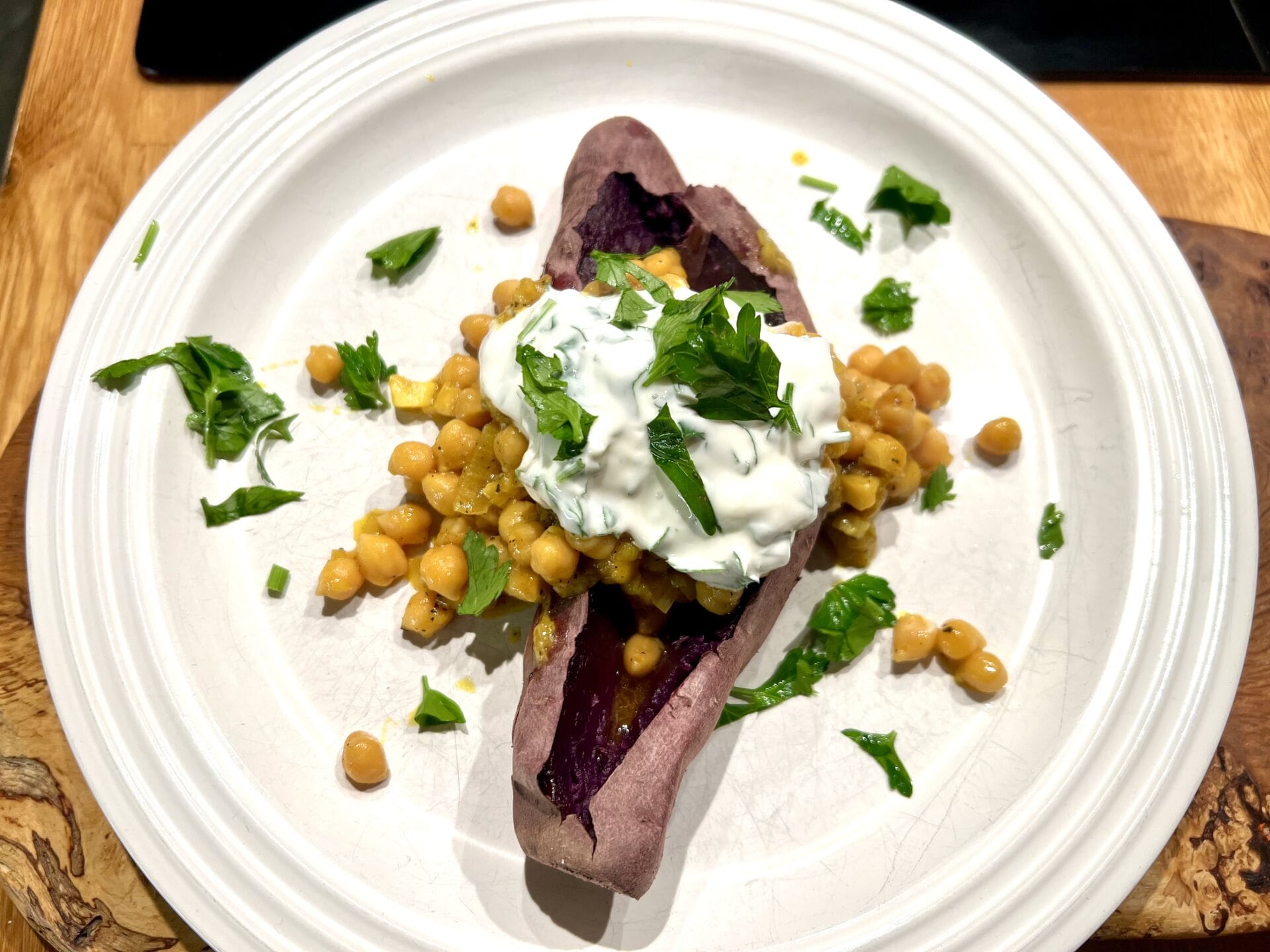 Baked purple potatoe with turmeric chickpeas and yoghurt: Eating for Longevity. Baked purple potatoe with turmeric chickpeas and yoghurt: Eating for Longevity.