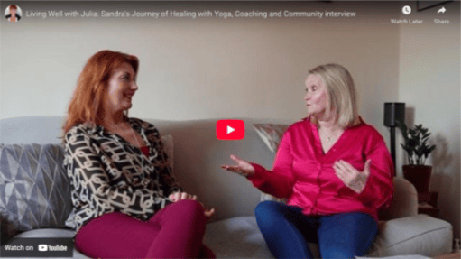 Two women seated on a sofa engaged in conversation, one gesturing with her hands. A YouTube video interface overlays the image.